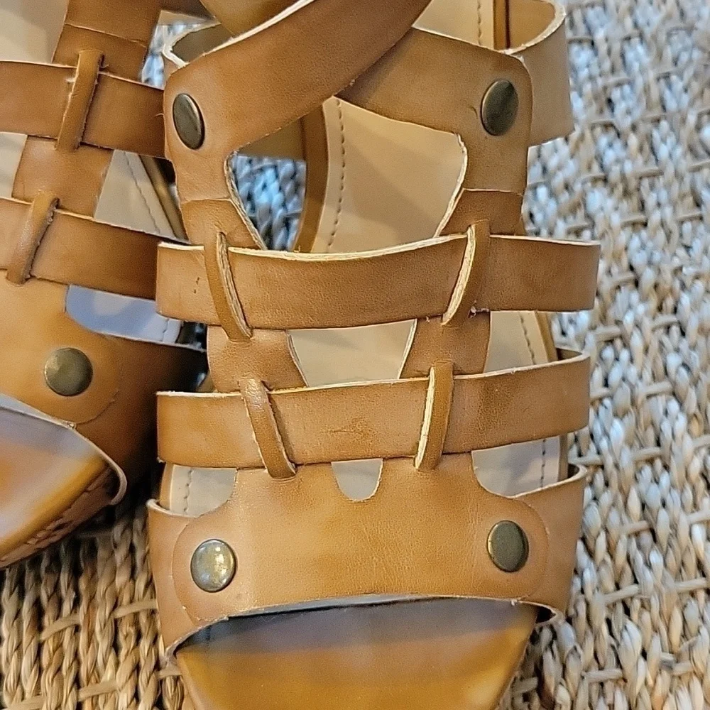 MARC FISHER brown strappy high heels.  Cork heel. Very high. Size is 7.5